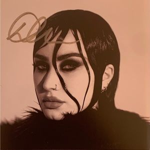 (1) Demi Lovato “Revamped” SIGNED art card and CD